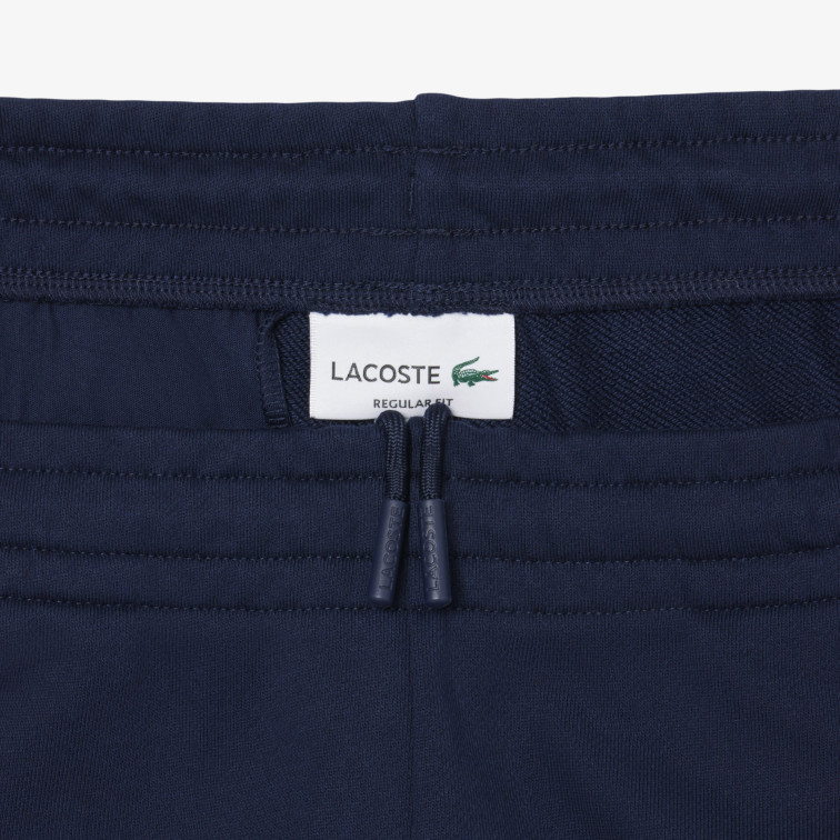 le short homme  lacoste shorts jog homme adulte maille